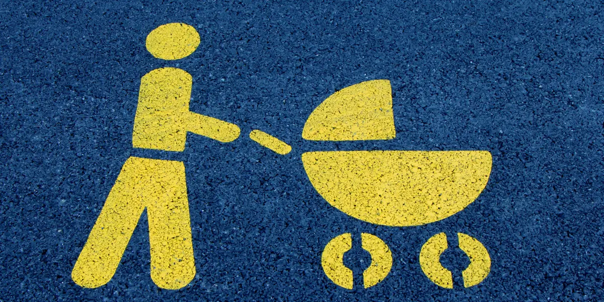 Mum and baby sign spray painted on floor