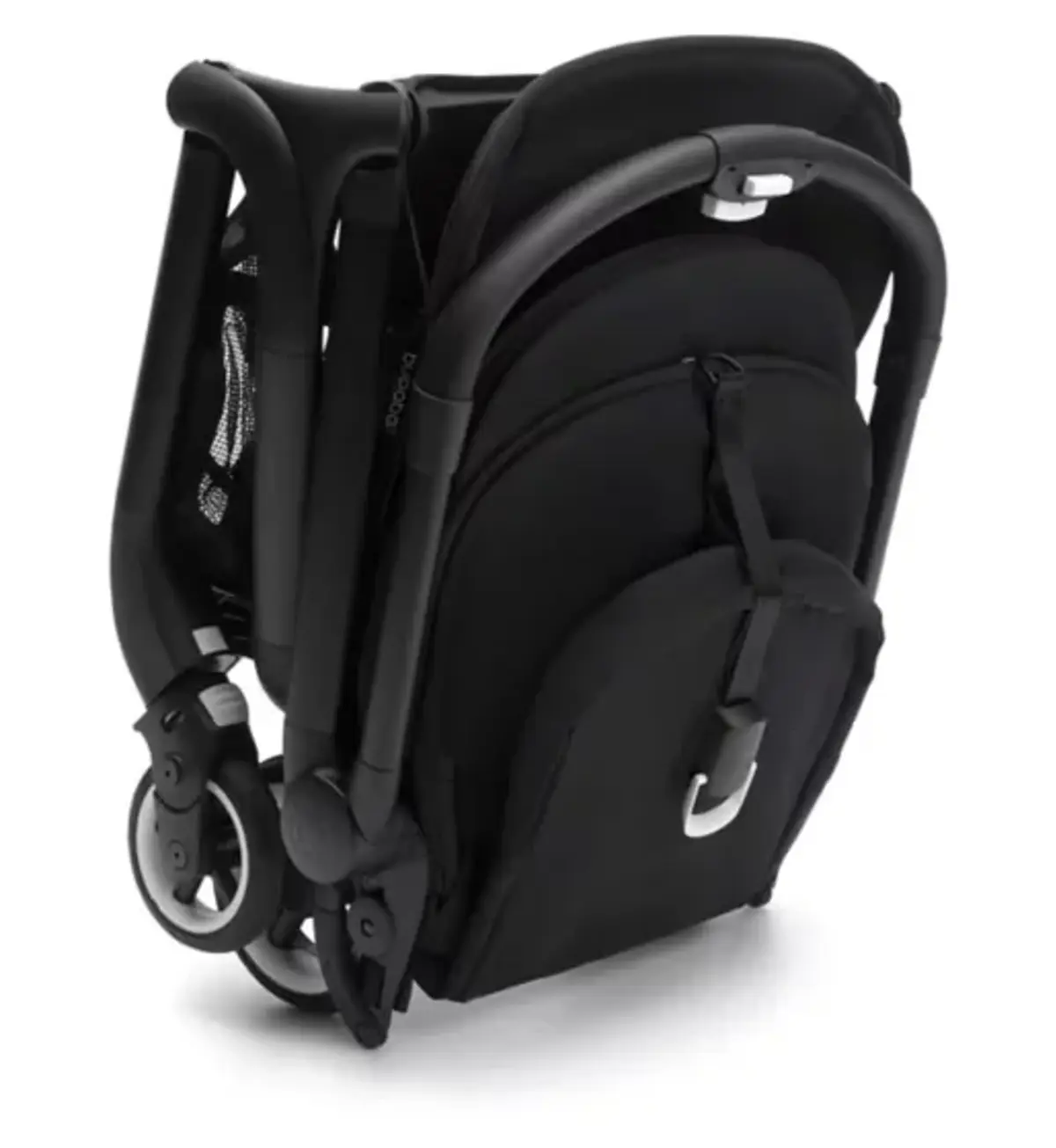 A travel stroller folded into a compact bundle