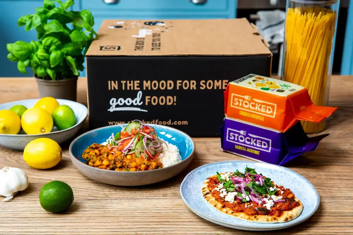 A Stocked frozen meal box with plated dishes