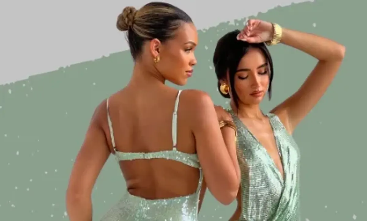 Two friends in green sparkly party dresses